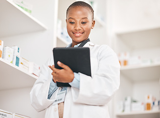 Image showing Inventory, pharmacist and black woman with a tablet, research and typing with network, update inventory and stock. African person, employee or medical professional with technology, check prescription