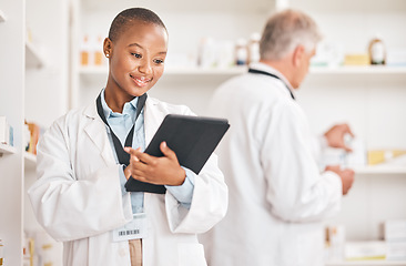 Image showing Smile, pharmacy and black woman with a tablet, connection and research on medication, prescription or treatment. Healthcare, pharmaceutical and African person with technology, medical stock and app