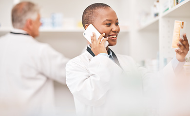 Image showing Pharmacy, phone call and woman with medicine box while reading information. African person or pharmacist talking on smartphone for telehealth, consultation or customer service and product label