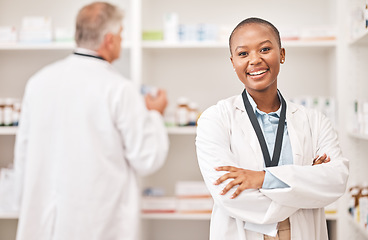 Image showing Smile, portrait and black woman or pharmacist with arms crossed for healthcare and service. Happy, expert and African doctor or medical employee with confidence in nursing and pharmaceutical career