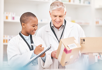 Image showing Man, woman and boxes in pharmacy for checklist, delivery schedule or stock report for medicine. Help, mentor and pharmacist team with inventory list, pharmaceutical product package with medical info.