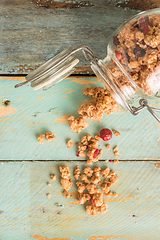 Image showing Glass jar with healthy breakfast cereal 