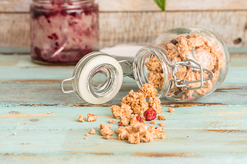 Image showing Glass jar with healthy breakfast cereal 