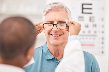 Image showing Optometrist, fitting glasses and senior man with smile, test and helping hand for healthy vision in retirement. Ophthalmologist, elderly patient and exam with lens, frame and wellness for eyesight