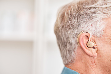 Image showing Hearing aid, closeup and ear of man with disability for medical support, help listening or healthcare at mockup space. Face of deaf patient with audiology implant for sound waves, amplifier or volume