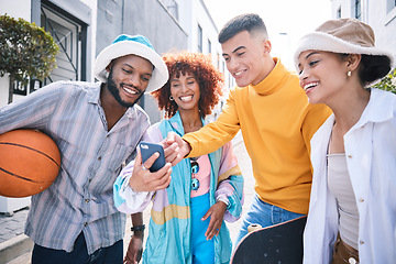 Image showing Gen z friends, phone and street with laugh, meme and streaming on social network, blog and happy in city. Student group, men and women with smartphone, comic video or point on web in Los Angeles cbd