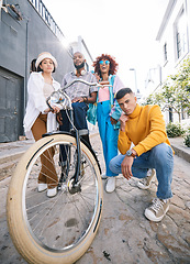 Image showing Friends group, bicycle and portrait outdoor for travel, fashion style and fun with young people in city. Diversity, gen z and men and women with cool attitude on student adventure on urban street