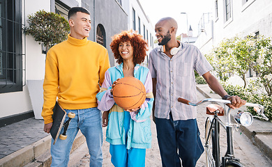 Image showing People, city and friends walking outdoor with a basketball and bicycle for student travel and fun. Diversity, talking and group of men and woman laugh on funny adventure and freedom on urban street