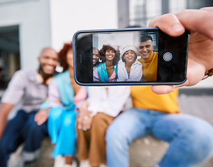 Image showing Friends, phone screen and selfie of people outdoor for travel, happiness and fun in city. Diversity, social media and profile picture of student group or men and woman with freedom on urban street