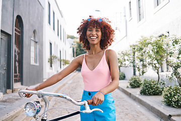 Image showing Bicycle, gen z or portrait of happy woman cycling with street fashion in urban outdoor activity on holiday. Excited city girl, streetwear or sustainable transport for trip or travel on bike in road