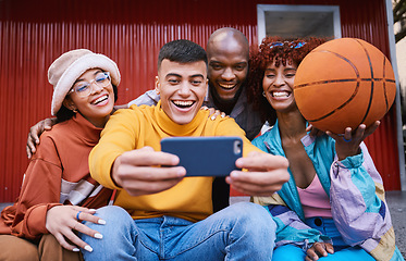 Image showing Selfie, basketball and friends in the city together taking a profile picture for fashion or urban style. Smile, social media and ball with a youth diversity group taking a mobile photograph in town