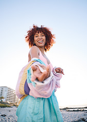 Image showing Portrait smile, woman and helping hand, offer or invitation at beach in low angle mockup space. Happy, palm and African person giving assistance in support, care or acceptance of handshake to welcome