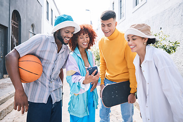 Image showing Gen z group, phone and city with laugh, meme and streaming on social network, blog and happy in street. Student friends, men and women with smartphone, comic video or post on web in Los Angeles metro