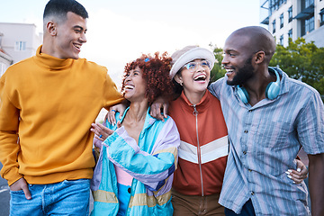 Image showing Friends, city and people laughing outdoor for travel, fashion and hug on journey. Diversity, happiness or gen z group of men and women on funny date, adventure and walking for freedom on urban street