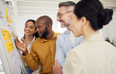 Image showing Whiteboard, collaboration and business people planning in office brainstorming for creative project. Professional, analysis and team of designers reading idea or information for strategy in workplace