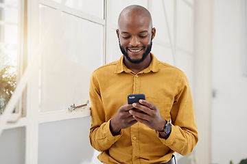 Image showing Business, happy black man and typing with phone in office for social network, mobile website and internet contact. Employee scroll on smartphone chat, reading news app and notification of information