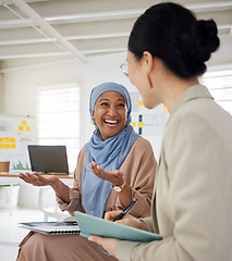 Image showing Collaboration, smile and a muslim business woman in the office with a colleague for planning in a meeting. Teamwork, training and coaching with a mentor talking to an employee in the workplace