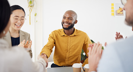 Image showing Creative people, handshake and meeting in hiring, partnership or teamwork together at office. Happy employees shaking hands in team agreement, b2b deal or thank you in startup recruiting at workplace