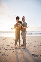 Image showing Parents, girl child and beach with airplane game, smile or portrait for bonding, love or sunset on holiday. Father, mother and daughter for plane, play or interracial family on vacation, waves or sea