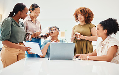 Image showing Laptop, document and women in office in discussion for teamwork brainstorming with manager. Diversity, planning and professional people with computer and paperwork for creative project in workplace.