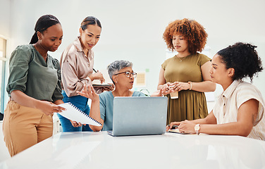 Image showing Laptop, discussion and business women in office in meeting for teamwork brainstorming. Collaboration, planning and professional female people with computer for creative website launch in workplace.