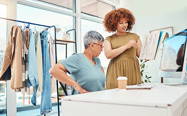 Image showing Planning teamwork or women with sketch for fashion design draft or drawing on paper for clothing line. Manager, internship or designer speaking or talking to mature mentor for creative advice or tips