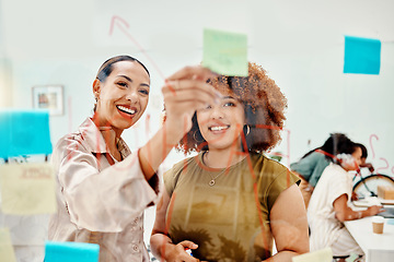 Image showing Creative women, brainstorming and teamwork, sticky note and meeting with objectives and agenda at startup. Communication, glass board and collaboration, research and ideas, discussion and strategy