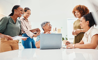 Image showing Laughing, meeting and women in fashion with a laptop for advice, communication or styling training. Discussion, happy and group of people in retail or boutique speaking about planning of clothes