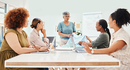 Image showing Creative woman, fashion designer and meeting in clothing discussion, style or ideas at the office. Group of female employees in team planning, design or garment in retail startup at the workplace