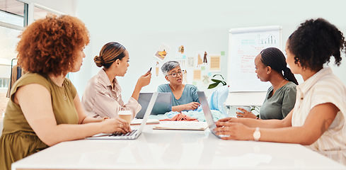 Image showing Creative woman, fashion designer and meeting in planning, team brainstorming or clothing ideas at office. Group of people in retail startup, project plan or discussion in teamwork, design or mission