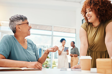 Image showing Talking, teamwork or women with advice for fashion design, planning or draft for small business clothing line. Smile, notebook or happy designer speaking to mature mentor for help in internship