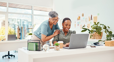 Image showing Training, teamwork or women with laptop for fashion design, planning or online draft for clothing line. Smile, computer or happy designer talking to mature mentor for advice in internship or coaching