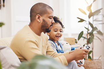 Image showing Video game, controller and father with girl on sofa for playing, bond and fun gaming at home together. Love, smile and parent with child in living room for esports, console or learning games in house