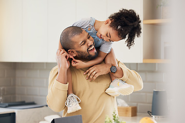 Image showing Happy family, hug and father and girl child in a kitchen with piggyback, games and fun, breakfast and laugh at home. Love, smile and parent with kid embrace, playful and bonding in a house on weekend