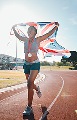 Image showing Runner, achievement and black woman with celebration, UK flag and sports with competition, pride and winner. African person, happy athlete or champion with British symbol, pride and medal for winning