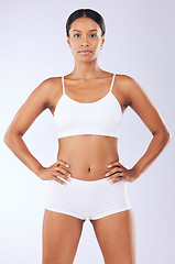 Image showing Portrait, health and woman in a bikini, wellness and training on a white studio background. Person, girl and model with exercise with fitness, weight loss and self care with confidence and aesthetic