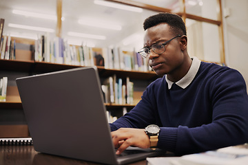 Image showing Student, frustrated and black man typing on a laptop in university or college campus angry due to assignment project. Online, studying and young person prepare for internet exam or doing research