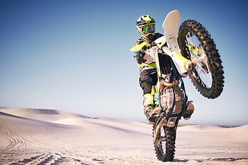 Image showing Bike, sand and balance with a man on mockup riding a vehicle in the desert for adventure or adrenaline. Motorcycle, training and freedom with an athlete on space in nature for power or competition