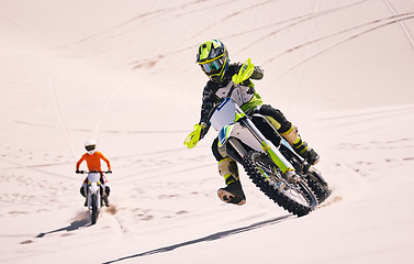 Image showing Dune, race and men on motorbike together for practice, training and extreme sports energy in nature. Professional dirt biking challenge, friends and danger with motorcycle competition on desert hill.