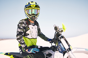 Image showing Sports, desert and man with helmet on motorbike for training, workout and challenge on sand. Extreme transport, travel and cyclist with motorcycle for adventure, freedom and adrenaline for action