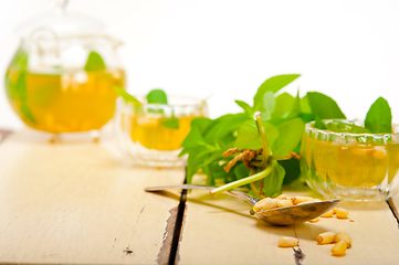 Image showing Arab traditional mint and pine nuts tea