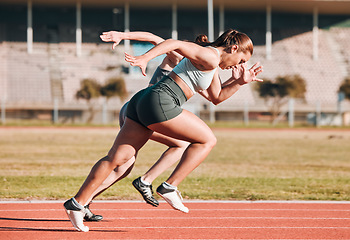 Image showing Fast, race and athletes running sprint in competition or fitness game and training for energy wellness on track. Sports, stadium and athletic people or runner exercise, speed and workout performance