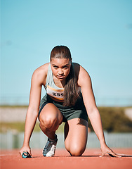 Image showing Start, running and fitness with woman on race track with baton for sports, competition and marathon. Exercise, health and wellness with runner in stadium for challenge, speed and energy performance