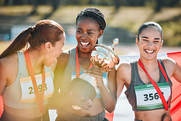 Image showing Athletics winner, trophy and sports women celebrate prize victory, competition award or winning marathon challenge. Success, diversity champion or happy athlete group excited for teamwork achievement