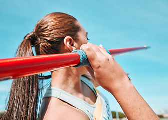 Image showing Woman, javelin and olympic athlete in sports competition, practice or training in fitness on stadium field. Active female person or athletic competitor throwing spear, poll or stick in distance