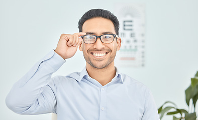 Image showing Happy man, face or glasses for vision, eye exam or optometry in clinic wellness, health or prescription frames. Person, portrait or Mexican patient in optician, ophthalmology and eyesight assessment