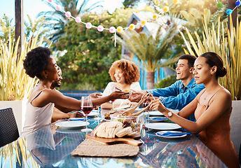 Image showing Friends, food and outdoor at a table for celebration, social gathering, happiness on holiday. Diversity, men and women group eating lunch at a party or reunion with drinks in garden for fun and relax