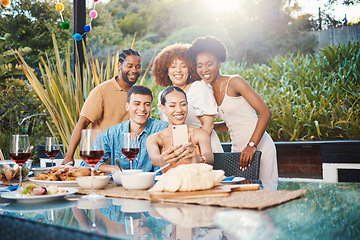 Image showing Selfie, friends at dinner together in garden and happy event with diversity, food and wine for outdoor party. Photography, men and women at table, group of people with drinks in backyard at sunset.