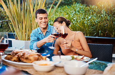 Image showing Smile, couple and toast with wine glass at restaurant, bonding and having fun. Happy, alcohol and man and woman cheers at dinner party, celebration date and drink together at outdoor table with food