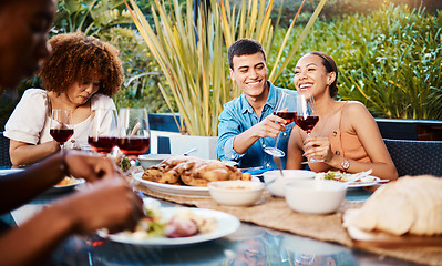 Image showing Happy, friends and cheers with wine glass at restaurant, bonding and having fun. Smile, alcohol and group of people toast at dinner party, celebration and drink, eating food and together at table